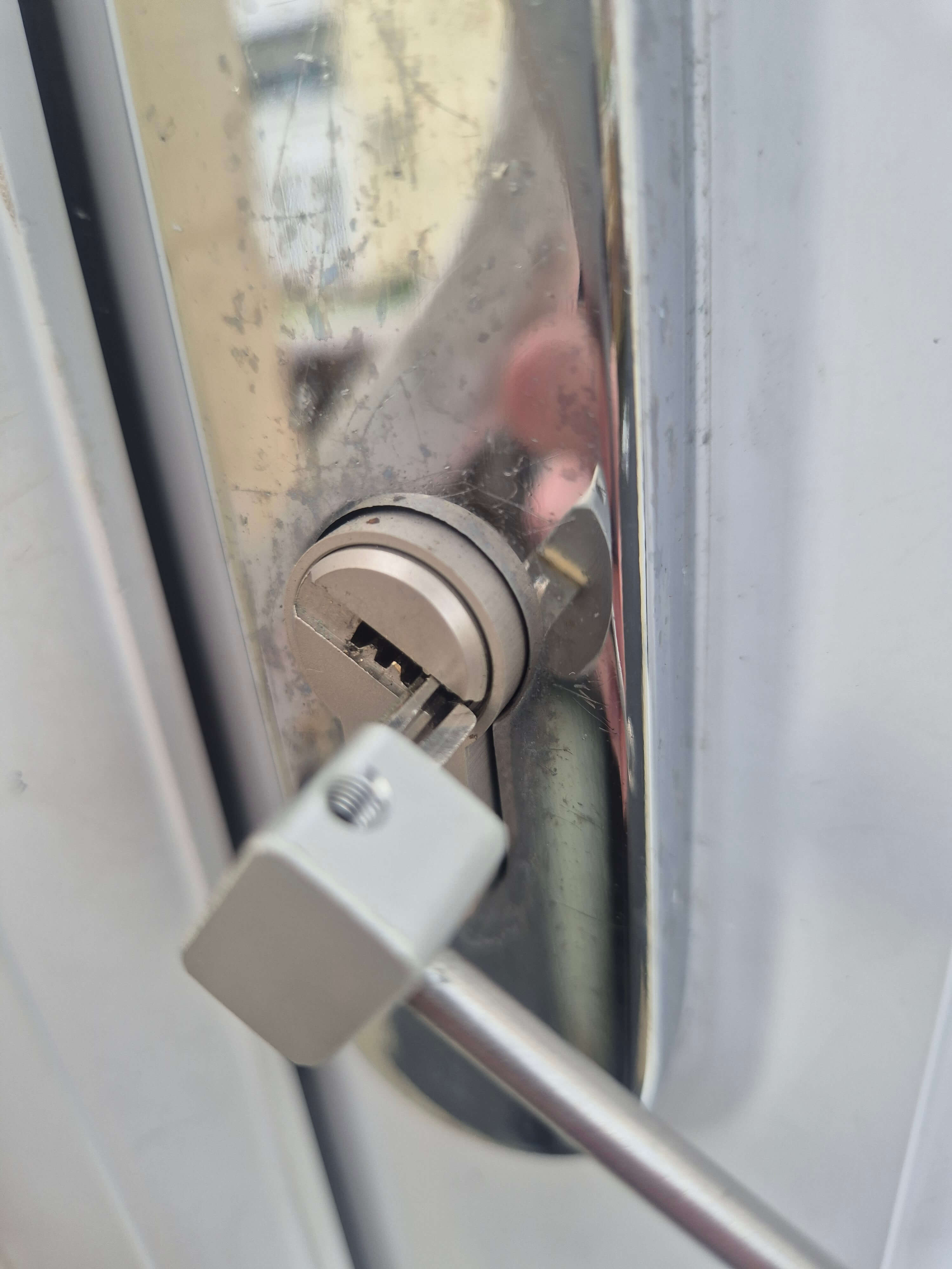 High security euro lock being picked open with specialist lock picking tool during emergency gain entry job in Leeds